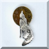 J046. Sterling and brass coyote howling at the moon pin. - $45 